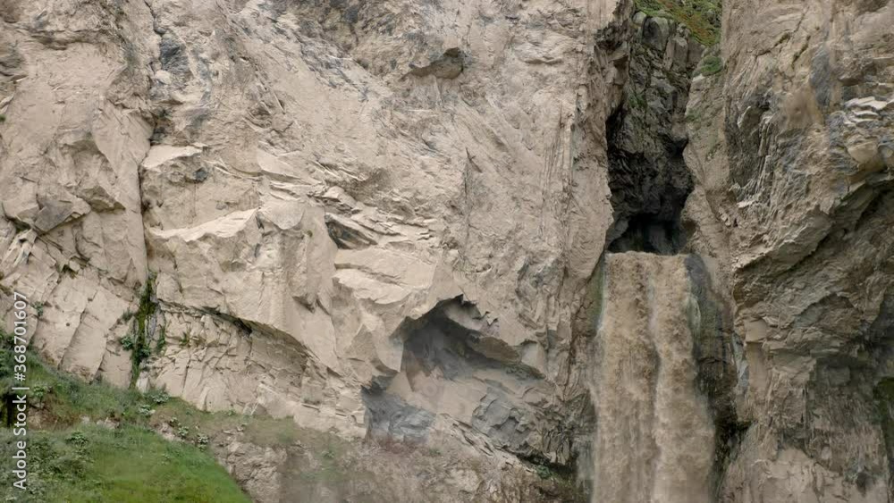 dirty waterfall sultan high in the mountains near elbrus in summer in the north caucasus in dzhilusu dirty waterfall sultan high in the mountains near elbrus in summer in the north caucasus in dzhilusu