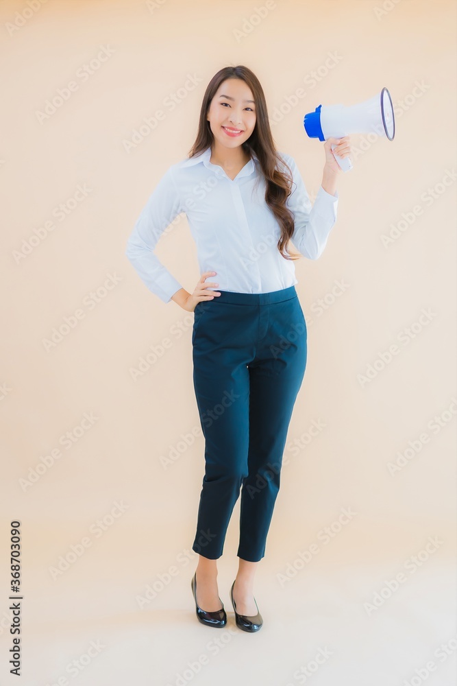 Portrait beautiful young asian business woman with megaphone Portrait beautiful young asian business woman with megaphone