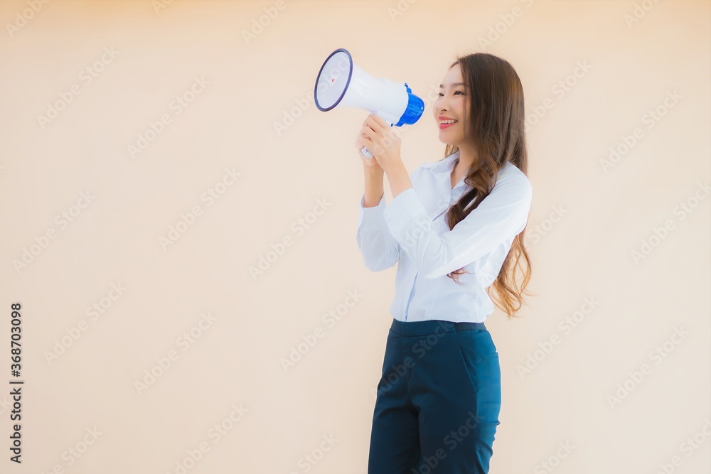 Portrait beautiful young asian business woman with megaphone Portrait beautiful young asian business woman with megaphone