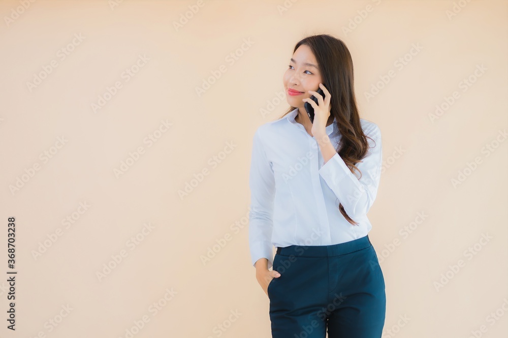 Portrait beautiful young business asian woman with smart mobile phone and coffee Portrait beautiful young business asian woman with smart mobile phone and coffee