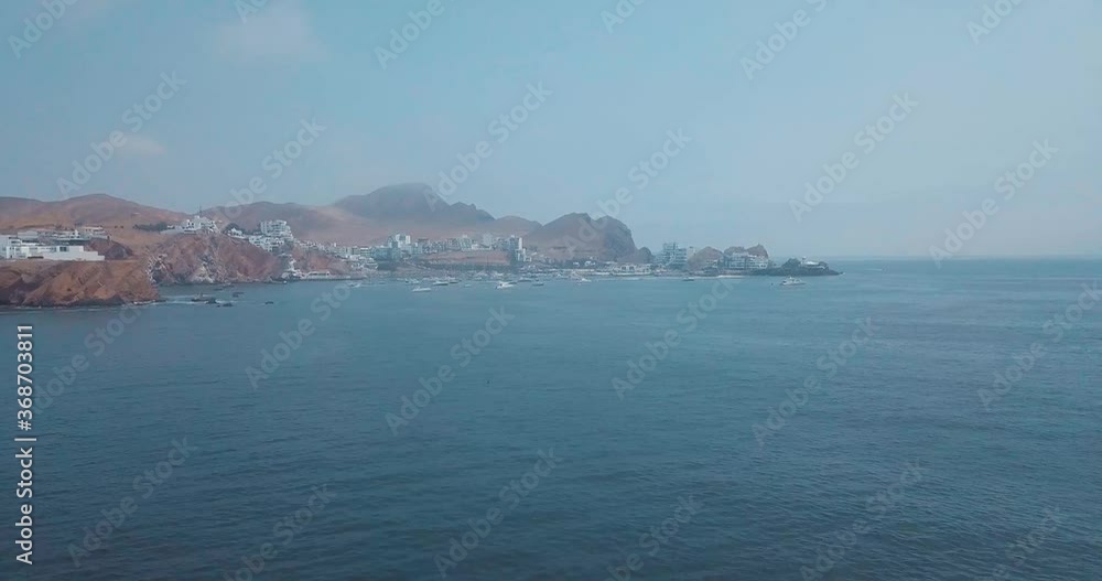 Aerial shot of the beach in Lima, Peru, in the middle of summer, before the 2020 pandemic Aerial shot of the beach in Lima, Peru, in the middle of summer, before the 2020 pandemic