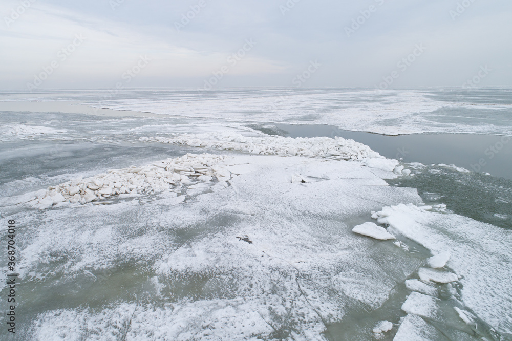 Aerial view of ice shove on the frozen lake Markermeer in winter, Netherlands Aerial view of ice shove on the frozen lake Markermeer in winter, Netherlands