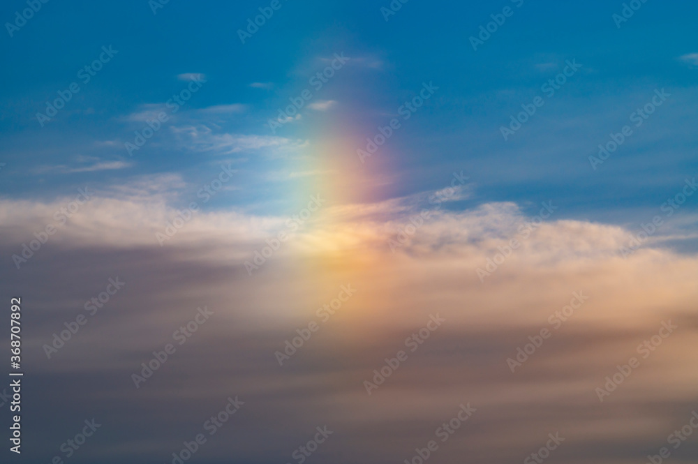 Vertical rainbow during cold winter morning