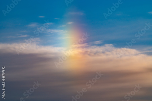 Vertical rainbow during cold winter morning