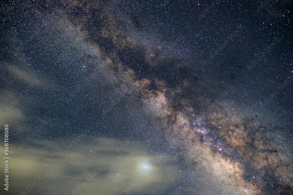 Fototapeta premium At night have stars, milky way and galaxies filled the dark sky.