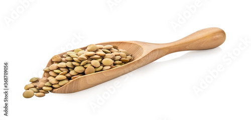 Obraz na płótnie Brown Lentils in wood spoon isolated on white background w salonie
