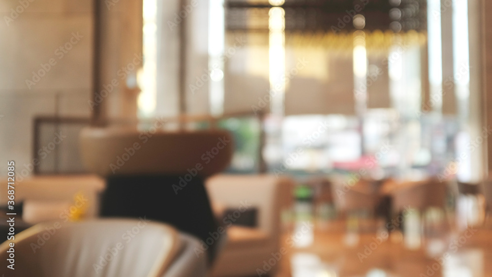 Blurred background image of modern coffee shop. abstract blur background with people in cafe. warm color tone style. Blurred background image of modern coffee shop. abstract blur background with people in cafe. warm color tone style.