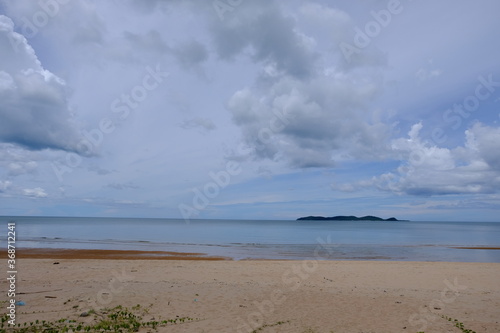 Bright beautiful seascape  sandy beach  clouds reflected in the water  natural minimalistic background and texture