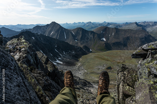 The concept of outdoor activities in the mountains. Minimalist mountain landscape. Atmospheric view. The majestic nature of the Circumpolar Urals. photo