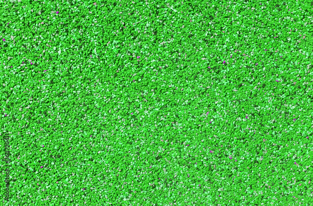 Fototapeta premium Background texture of small pebbles of green color.