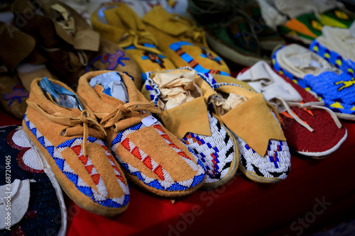 Handmade leather Native American Indian moccasins at a powwow in San Francisco photo