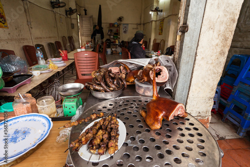 Obraz na płótnie dog meat served in local vietnamese restaurant in Hanoi w salonie