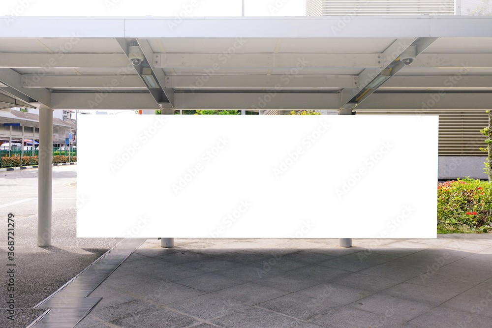 Edited visual for advertising billboard display at pedestrian walkway of MRT train station. Blank billboards of advertising space for mock up purpose; OOH ad placement Edited visual for advertising billboard display at pedestrian walkway of MRT train station. Blank billboards of advertising space for mock up purpose; OOH ad placement