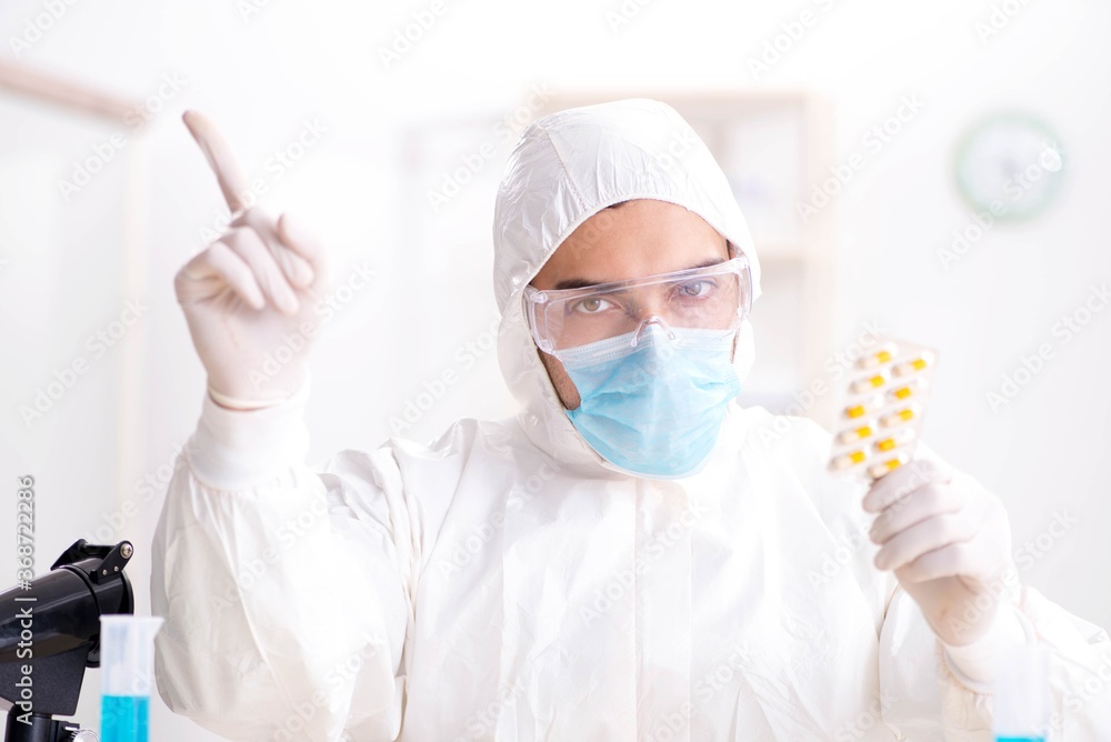 Lab assistant in drug synthesis concept Lab assistant in drug synthesis concept