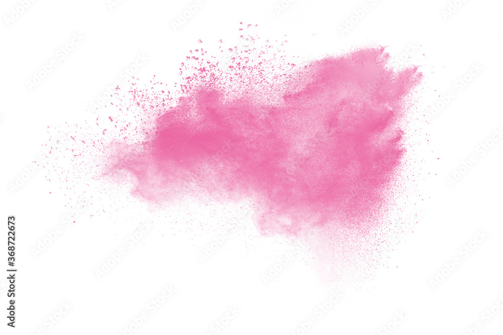 Pink powder explosion on white background. Pink dust splash cloud.Launched colorful particles.