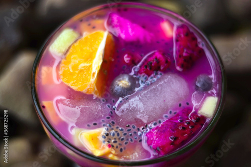 Close up Fruit Soup, fresh fruit mixed with milk, ice and fresh syrup to relax. Top view photo