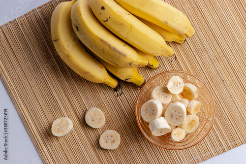 banana, fruit, food, yellow, bananas, bunch, isolated, healthy, fresh, ripe, white, organic, tropical, diet, sweet, snack, natural, freshness, closeup, eating, vegetarian, peel, sliced, health, eat