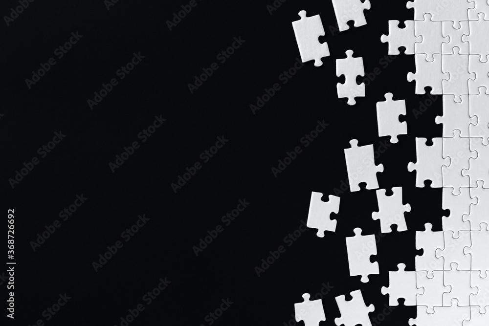 White gray pieces of puzzles are scattered, stacked on right side of black background. Red inscription on left of canvas. Problem of self destruction concept. Find solution, support, help. White gray pieces of puzzles are scattered, stacked on right side of black background. Red inscription on left of canvas. Problem of self destruction concept. Find solution, support, help.