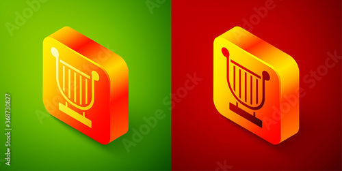 Isometric Ancient Greek lyre icon isolated on green and red background. Classical music instrument, orhestra string acoustic element. Square button. Vector.