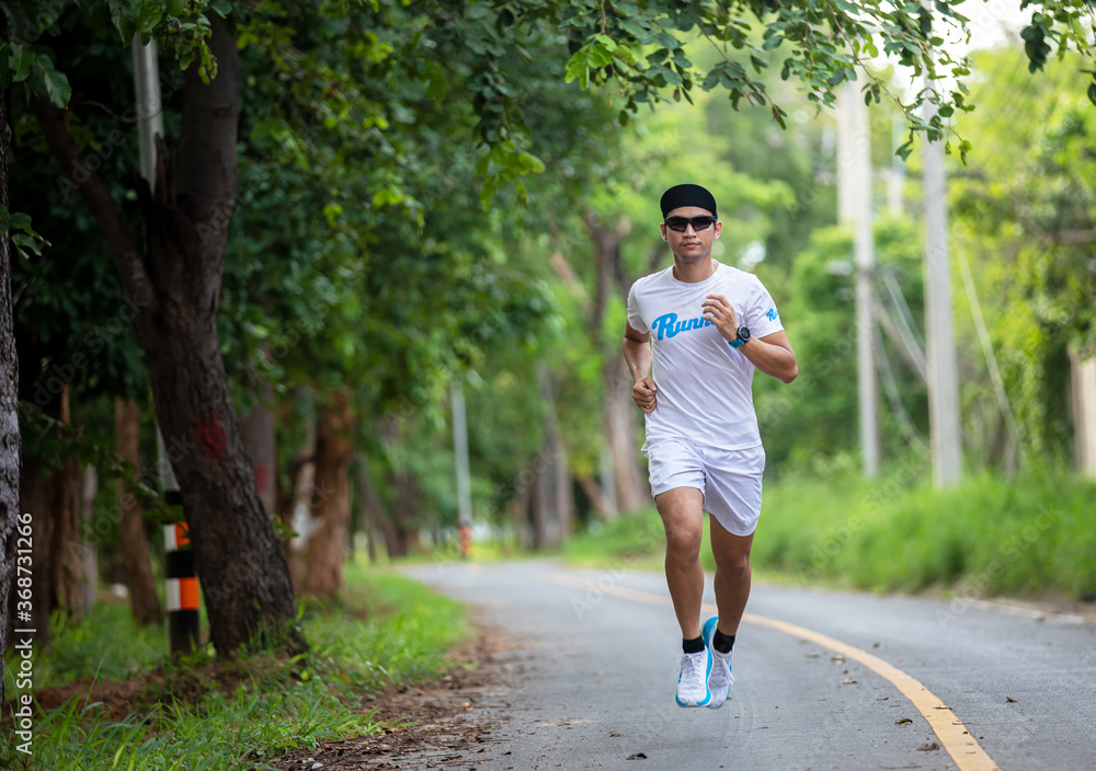 Asian men jogging and running in the park