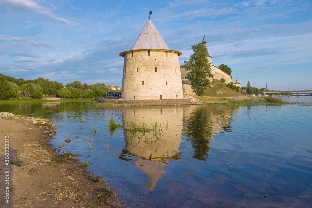 Flat tower in the Pskov Kremlin on a sunny July day. Russia