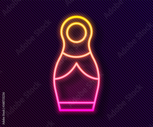 Glowing neon line Russian doll matryoshka icon isolated on black background. Vector.