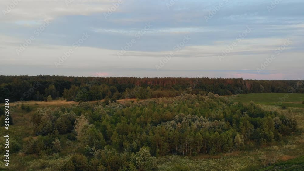 Aerial video of a landscape in the countryside. Shooting time - gold hour. Aerial video of a landscape in the countryside. Shooting time - gold hour.