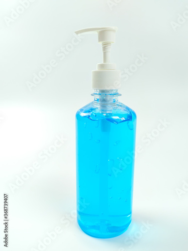 Alcohol gel bottles for hand washing. Disinfecting alcohol. Handwashing alcohol has a clear blue color on a white background.