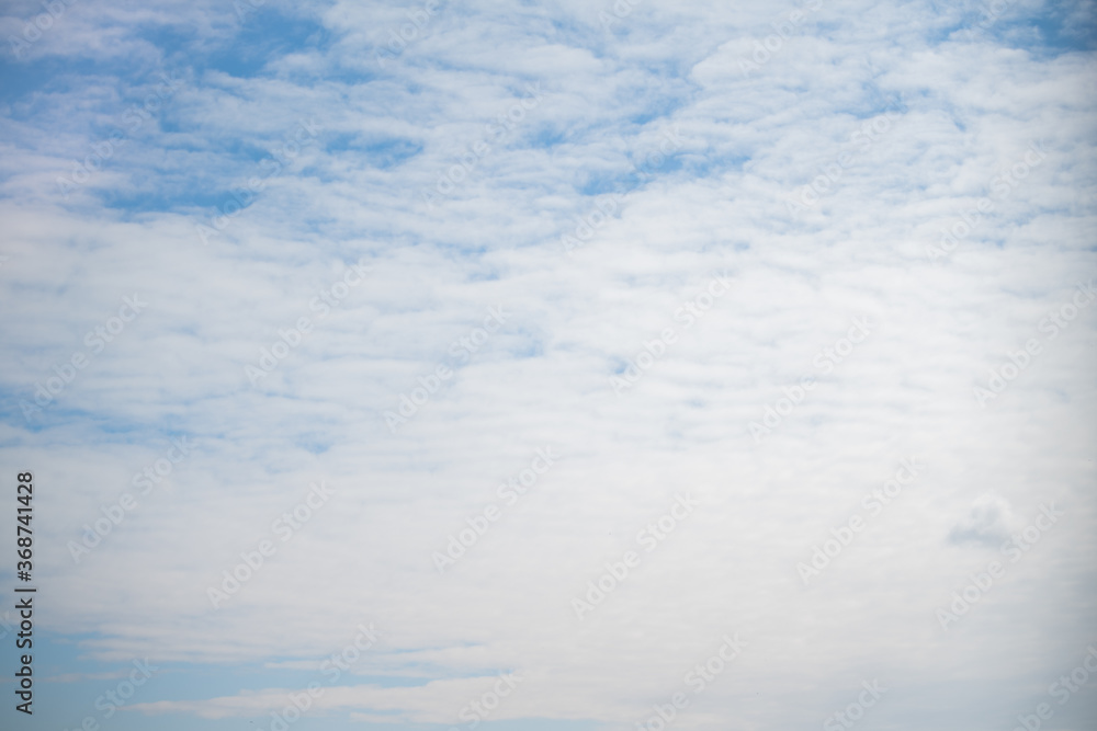 clear blue sky on a summer day with light cirrus clouds clear blue sky on a summer day with light cirrus clouds