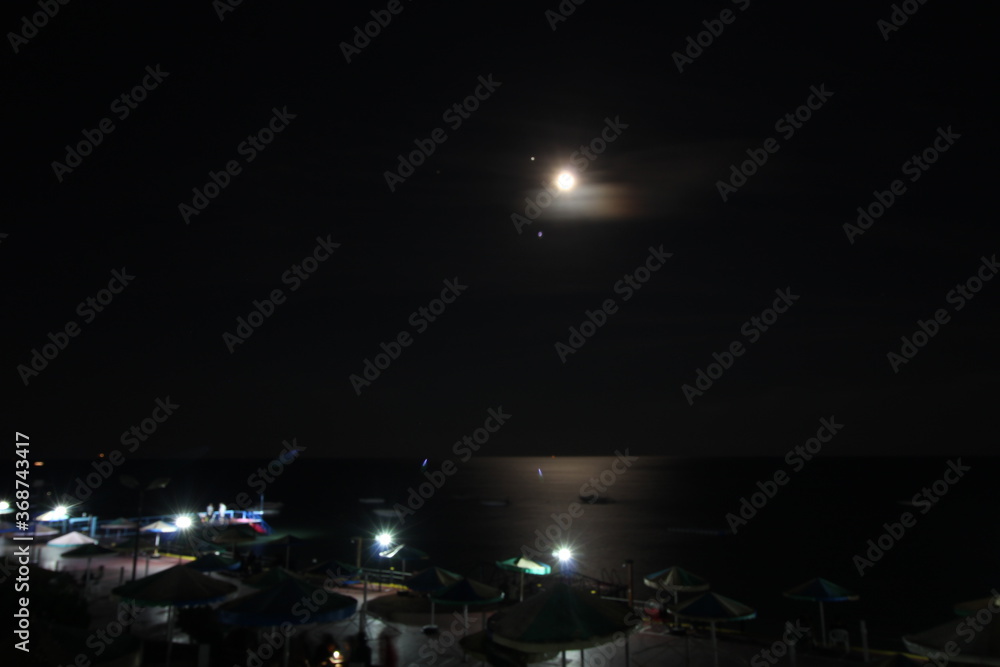 pier in the moonlight at night pier in the moonlight at night