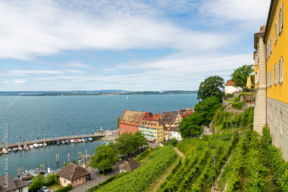 Meersburg, Germany - June 30, 2020: View of the lower town from the vineyard