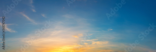 Gorgeous panorama scenic of sunrise and sunset with silver lining and cloud in the morning and evening. Panoramic landscape image. © tanarch