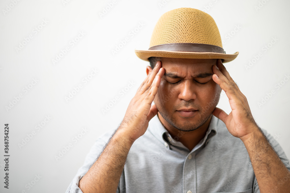 Young asian casual business man hand in head he's feeling depressed, stress, headache be tired from working long time he symptom office syndrome.