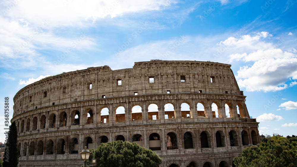 Colosseum in Rome, Italy with blue sky  which Ancient Roman Colosseum is one of main tourist attractions in Europe