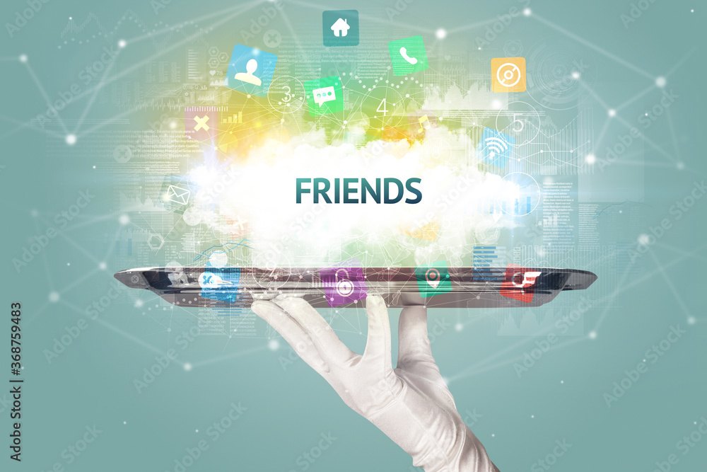 Waiter serving social networking concept with FRIENDS inscription Waiter serving social networking concept with FRIENDS inscription