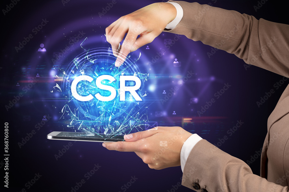 Close-up of a touchscreen with CSR abbreviation, modern technology concept