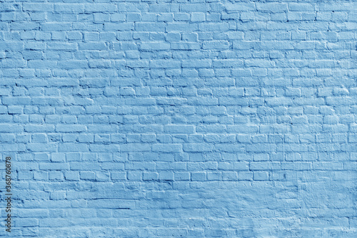 The background of the old blue brick wall for design interior and various scenes or as a background for video interviews.