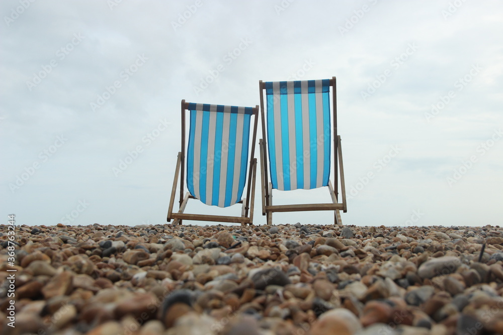 Beach chairs by the Brighton sea in UK