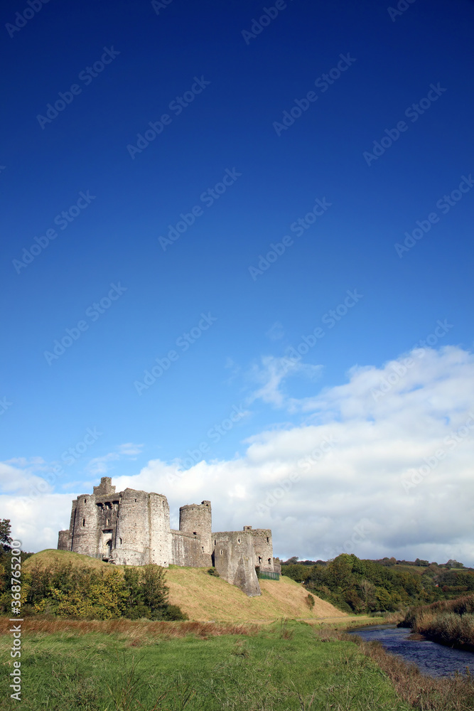 Kidwelly Castle gatehouse by the River Gwendraeth Wales Carmarthenshire UK a ruin of a 13th century medieval fort and a popular travel destination visitor attraction landmark of the city stock photo