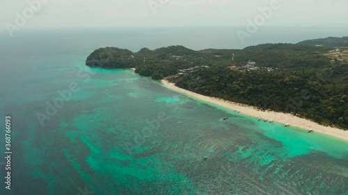 Wallpaper Mural Coast with sandy beach with tourists and clear blue sea top view, Puka shell beach. Boracay, Philippines. Seascape with beach on tropical island. Summer and travel vacation concept. Torontodigital.ca