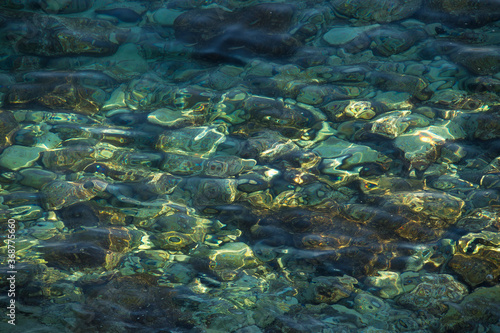 Fototapeta Naklejka Na Ścianę i Meble -  stones in clear sea water