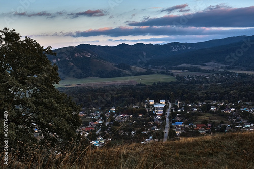 mountain view sky clouds forest photo