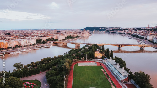 Tableau sur toile Aerial view of Budapest soccer field on margaret island and colorful cityscape i