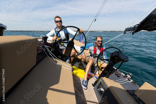 two men sailing on a yacht © Daniel Teetor