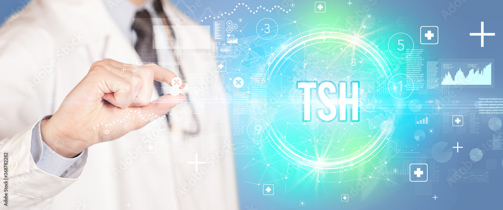 Close-up of a doctor giving you a pill with TSH abbreviation, virology concept Close-up of a doctor giving you a pill with TSH abbreviation, virology concept