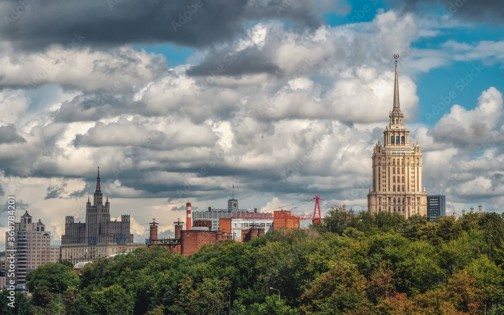 Beautiful Moscow cityscape. Panoramic view of Moscow with beautiful houses on a green hill