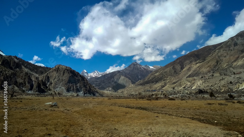 mountain landscape with blue sky and clouds