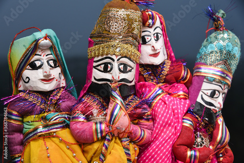 Indian handicraft, handmade puppet attached string, King and queen Rajasthan India. Dolls men and women face wearing traditional dress saree, sari, Kurta for plays, Dussehra, Dasara, Diwali festival