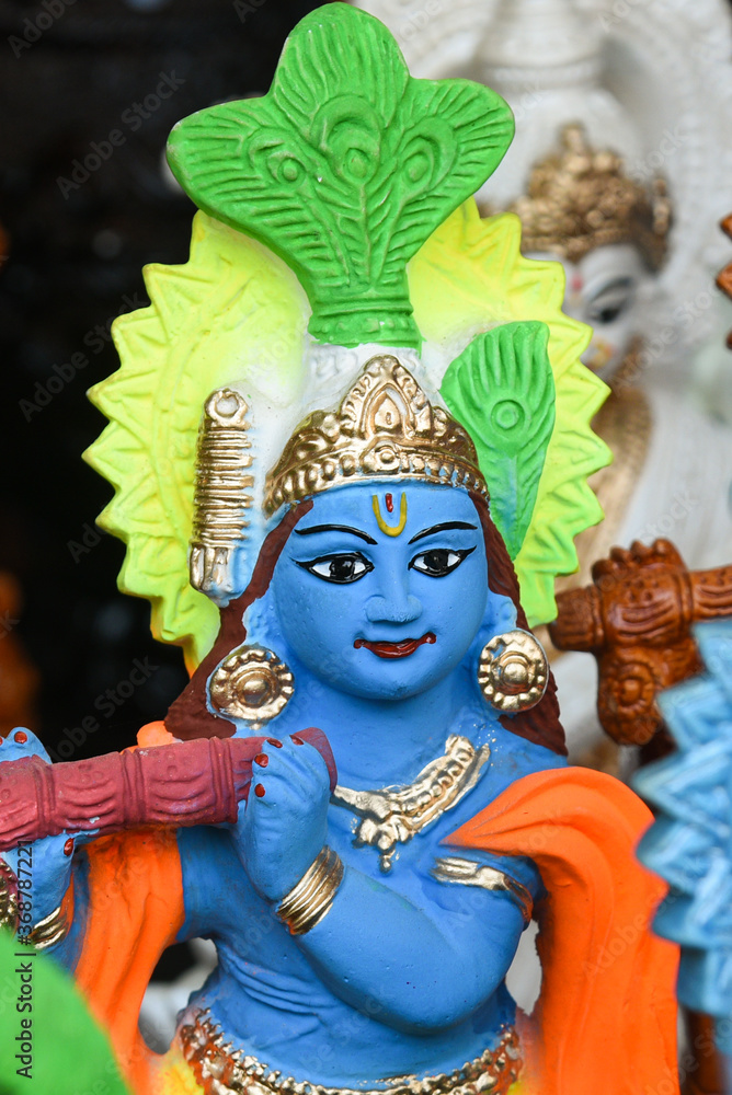 Indian handicraft statue of god Lord Krishna, handmade colorful