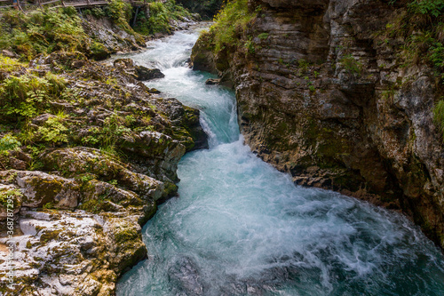 seething streams in a mountain river in an alpine gorge